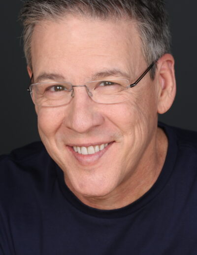 Randy Cole Headshot with Glasses & Tilt